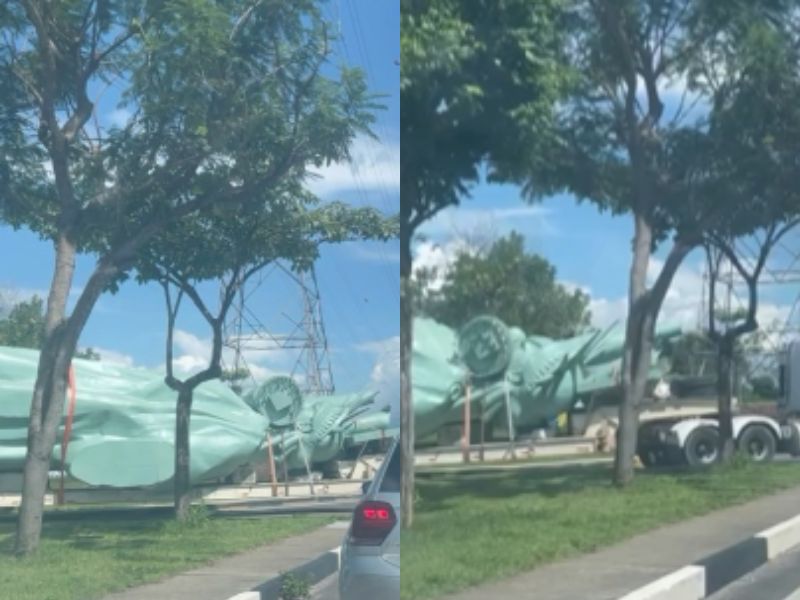 Estátua da liberdade é vista em avenida de Manaus