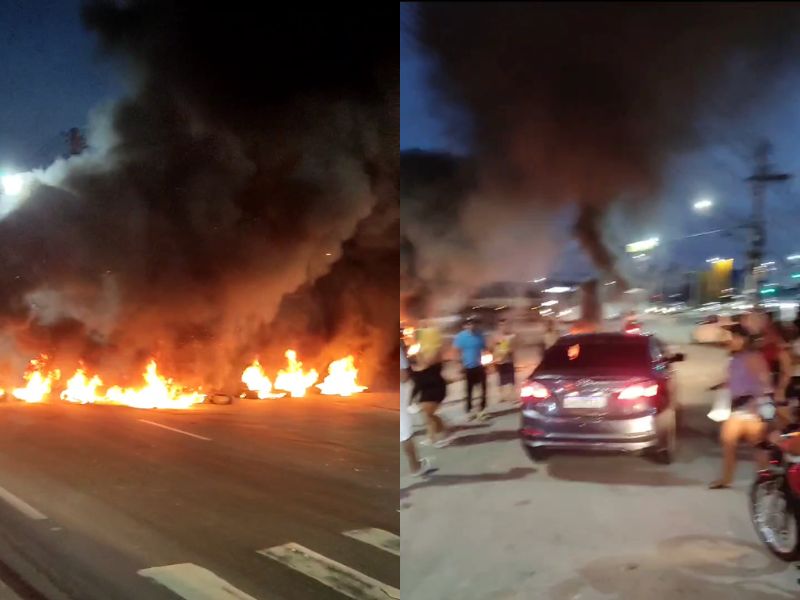 Moradores tocam fogo em pneus durante manifestação por causa de alagamentos em Manaus